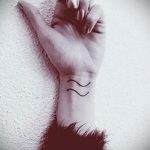 Vízöntő tetoválás - fotó - példa a kész tetoválásra 01082016 4081 tatufoto.ru