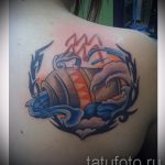 Vízöntő tetoválás - menő fotó - példa a kész tetoválásra a 01082016 12092 tatufoto.ru