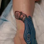 Vízöntő tetoválás - menő fotó - példa a kész tetoválásra a 01082016 23103 tatufoto.ru