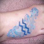 Vízöntő tetoválás - menő fotó - példa a kész tetoválásra a 01082016 26106 tatufoto.ru