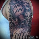 Vízöntő tetoválás a vállán - fotó - példa a kész tetoválásra 01082016 3133 tatufoto.ru