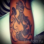 Vízöntő tetoválás a vállán - fotó - egy példa a kész tetoválásra 01082016 4134 tatufoto.ru