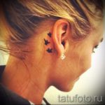 madártetoválás a fül mögött 2