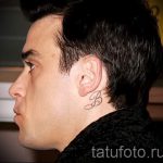 a férfiak fültetoválása mögött - fényképek a kész tetoválási lehetőségekről 9