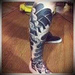 hullámos tetoválás a lábán a férfiak számára