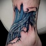 robo-szerelő tetoválás a lábán férfiaknak