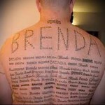 момиче име и надписи - мъжка татуировка на гърба