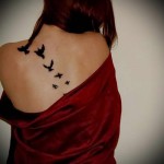 ptice u letu natrag tetovaže žene