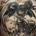 fantázia tetoválás - lány karddal