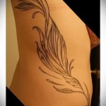 roślinność - kobiecy tatuaż boczny