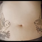 татуировка на бухал на женския корем