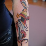 old school tetoválás - a tőr levágja a polip csápjait