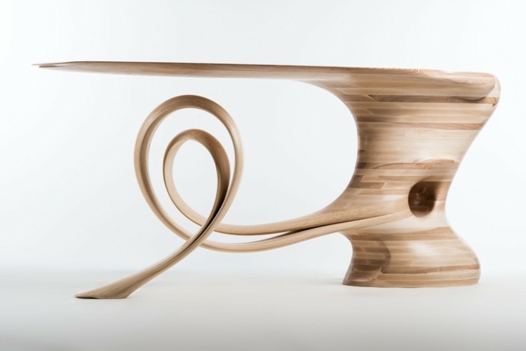 Myšlienka dizajnu pochádza od Roberta Scotta dizajn stola vyrobený z laminátovej sochy praktický nápad