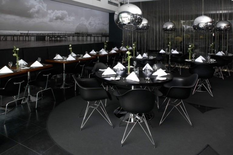 design-hotels-Germany-ueberfluss-bremen-restaurant-black-eames-chair