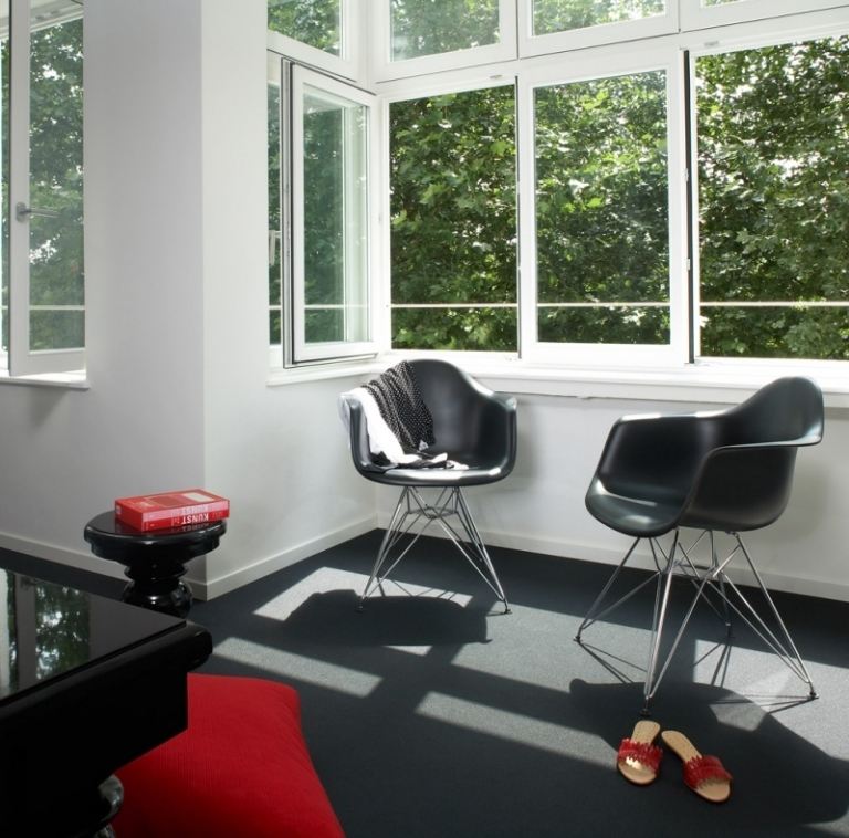 design-hotels-Germany-ueberfluss-bremen-zimmer-black-white-eames-chair