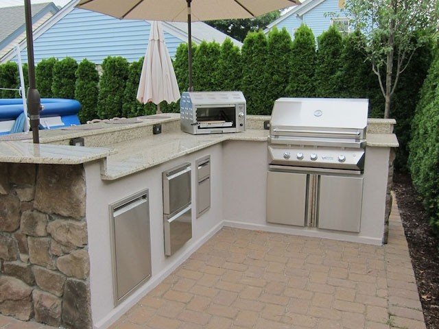 Výrobca grilu Twin Eagles používa vonkajšiu kuchyňu Výrobca grilu Twin Eagles používa vonkajšiu kuchyňu