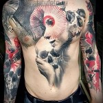 Trash Polka Tattoo - dziewczyna i czaszka na klatce piersiowej i brzuchu