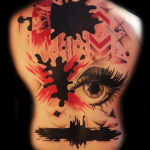 Trash Polka Tattoo - oczy i plamy na plecach