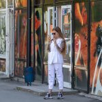 Zdjęcie dziewczyny z tatuażem na rękawie - lew z niebieskimi oczami i skrzydłami - 05.09.2020 - Street tattoo - 3