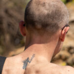 Tatuaż Kolovrat i trójząb Posejdona dla mężczyzny - Street tattoo nr 04 - 06.12.2020 dla 2 osób