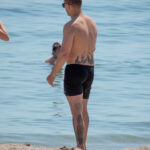 Zdjęcie tatuażu z jaskółkami na dolnej części pleców faceta - Street tattoo № 04 - 06.12.2020 za 6