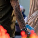 وشم مع صورة لفتاة على الذراع اليسرى لشاب شاب - وشم الشارع 09/14/2020-4