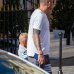 Tatuaż na rękawie z zamkami feniksa i portretem świętego na ramieniu mężczyzny - Street tattoo -29.09.