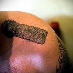 لص الوشم كتاف الصورة