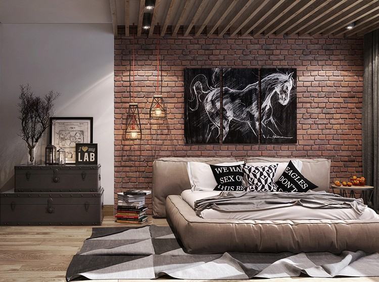 červená tehlová stena a béžová čalúnená posteľ v spálni dizajn spálne-steny-tehlová stena-orientovaná tehla-čalúnená posteľ