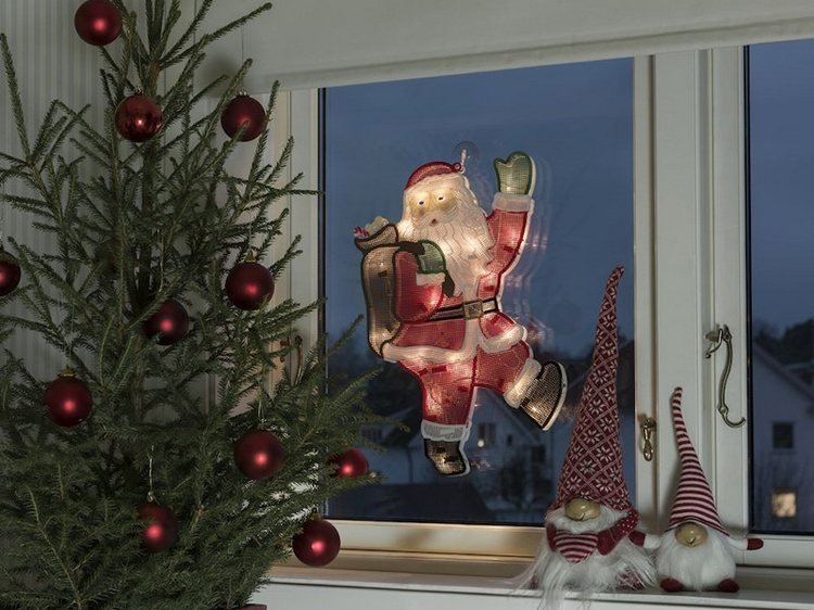 vianočné svetlá na okno svietiaca silueta santa claus