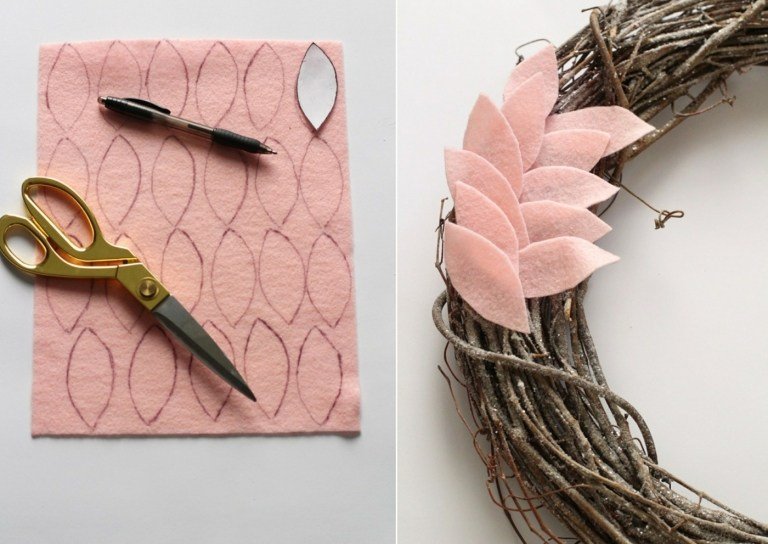 Moderný vzhľad vianočného dverného venca s listami z ružového filcu a vínneho venca