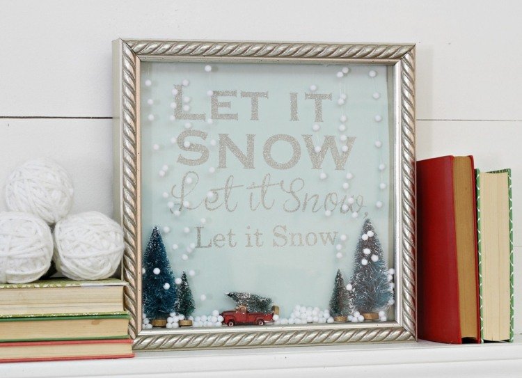 Drotárska zimná krajina z rámov obrazov a vianočných figúrok