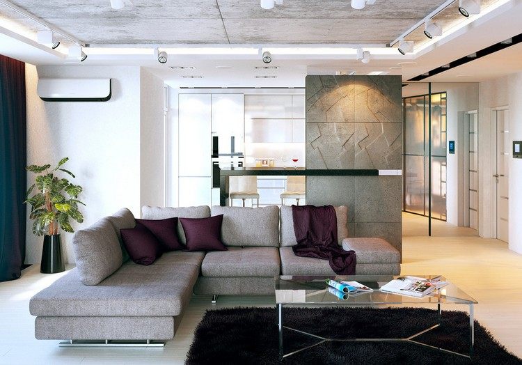 biele LED reflektory a odhalený betónový strop v obývačke osvetlenie-obývačka-zavesený-strop-odhalené-betónové-bodové svetlá-priemyselný štýl