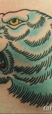 fotó egy jegesmedve tetoválásról, dátum: 2017.12.03. №059 - fehér medve tetoválás -