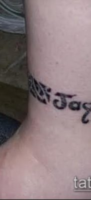 صورة لسوار الوشم (قيمة) - مثال على تصميم وشم مثير للاهتمام - 050