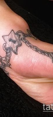 صورة لسوار الوشم (قيمة) - مثال على تصميم وشم مثير للاهتمام - 044