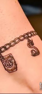 صورة لسوار الوشم (قيمة) - مثال على تصميم وشم مثير للاهتمام - 043