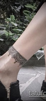 صورة لسوار الوشم (قيمة) - مثال على تصميم وشم مثير للاهتمام - 037