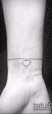 صورة لسوار الوشم (قيمة) - مثال على تصميم وشم مثير للاهتمام - 032