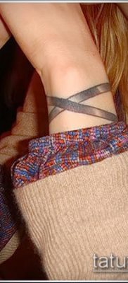 صورة لسوار الوشم (قيمة) - مثال على تصميم وشم مثير للاهتمام - 030