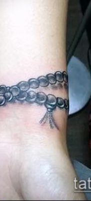 صورة لسوار الوشم (قيمة) - مثال على تصميم وشم مثير للاهتمام - 028