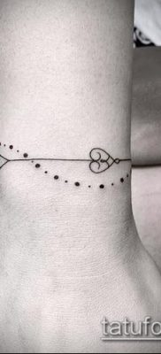 صورة لسوار الوشم (قيمة) - مثال على تصميم وشم مثير للاهتمام - 026