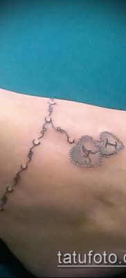 صورة لسوار الوشم (قيمة) - مثال على تصميم وشم مثير للاهتمام - 024
