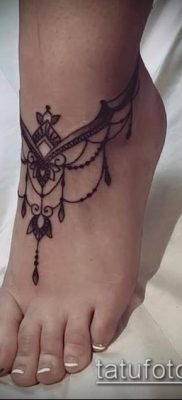 صورة لسوار الوشم (قيمة) - مثال على تصميم وشم مثير للاهتمام - 018