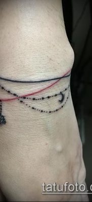 صورة لسوار الوشم (قيمة) - مثال على تصميم وشم مثير للاهتمام - 014