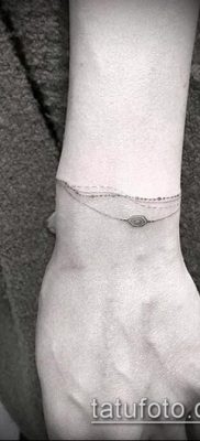 صورة لسوار الوشم (قيمة) - مثال على تصميم وشم مثير للاهتمام - 011