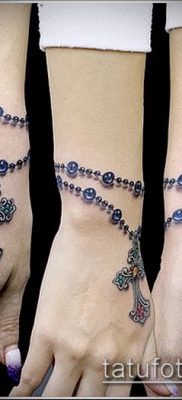 صورة لسوار الوشم (قيمة) - مثال على رسم وشم مثير للاهتمام - 003