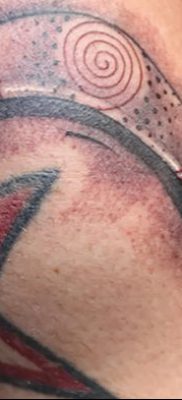 fotó a bumeráng tetoválásról, kelt 2017.12.10., №043 - bumeráng tetoválás -