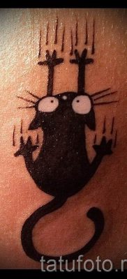 fotó egy fekete macskával készült tetoválásról a tetoválás jelentéséről szóló cikkhez - tatufoto.ru - 2