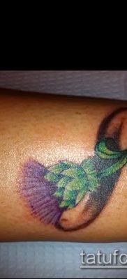 fénykép a bogáncs tetoválásról (jelentése) - egy példa egy érdekes tetoválásrajzra - 012